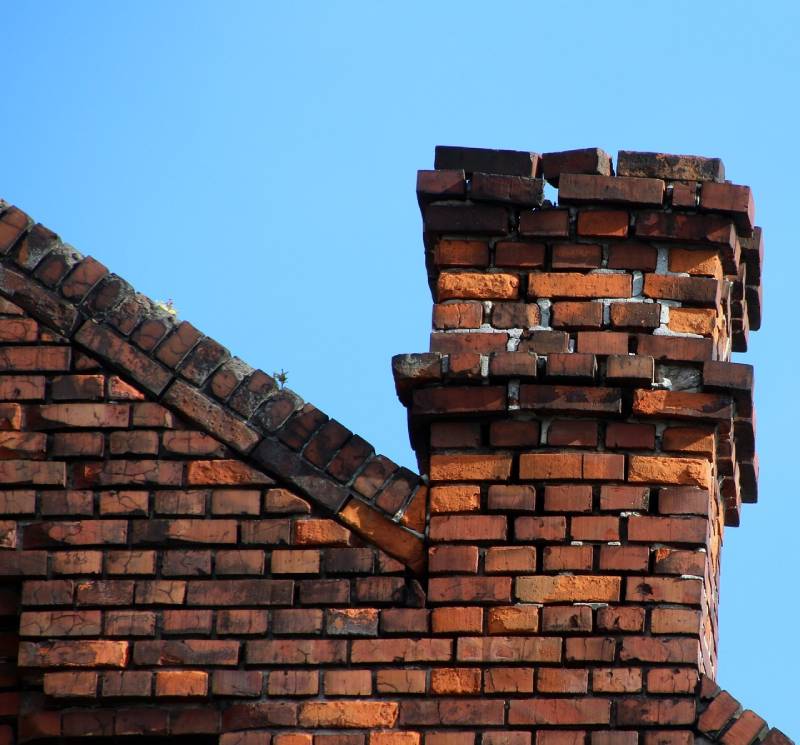 Signs Your Malibu Home Needs a Chimney Inspection Damaged chimney on an Malibu home showing cracks and missing mortar